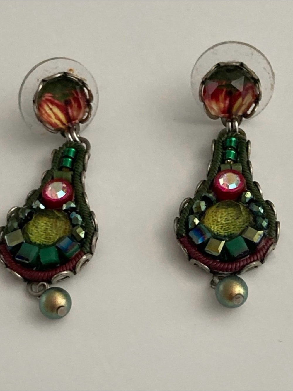 AyalaBar handcrafted teardrop earrings featuring an intricate mix of green